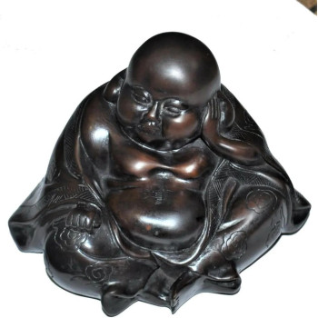 A Oriental Bronzed Composite Statue Of A Young Man Dreaming