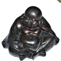A Oriental Bronzed Composite Statue Of A Young Man Dreaming