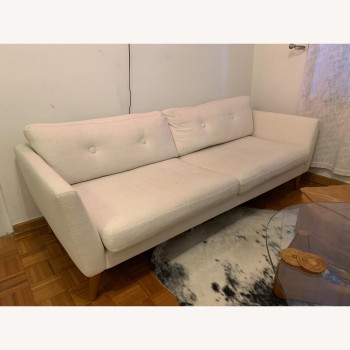 Deep Sleep Office Sofa - a modern, white 3-seater. Stylishly upholstered and supported by cherry-stained wood legs. (WHITE)