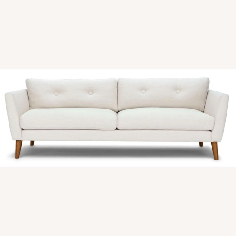 Deep Sleep Office Sofa - a modern, white 3-seater. Stylishly upholstered and supported by cherry-stained wood legs. (WHITE)