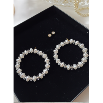 Bousni Pearls earrings...
